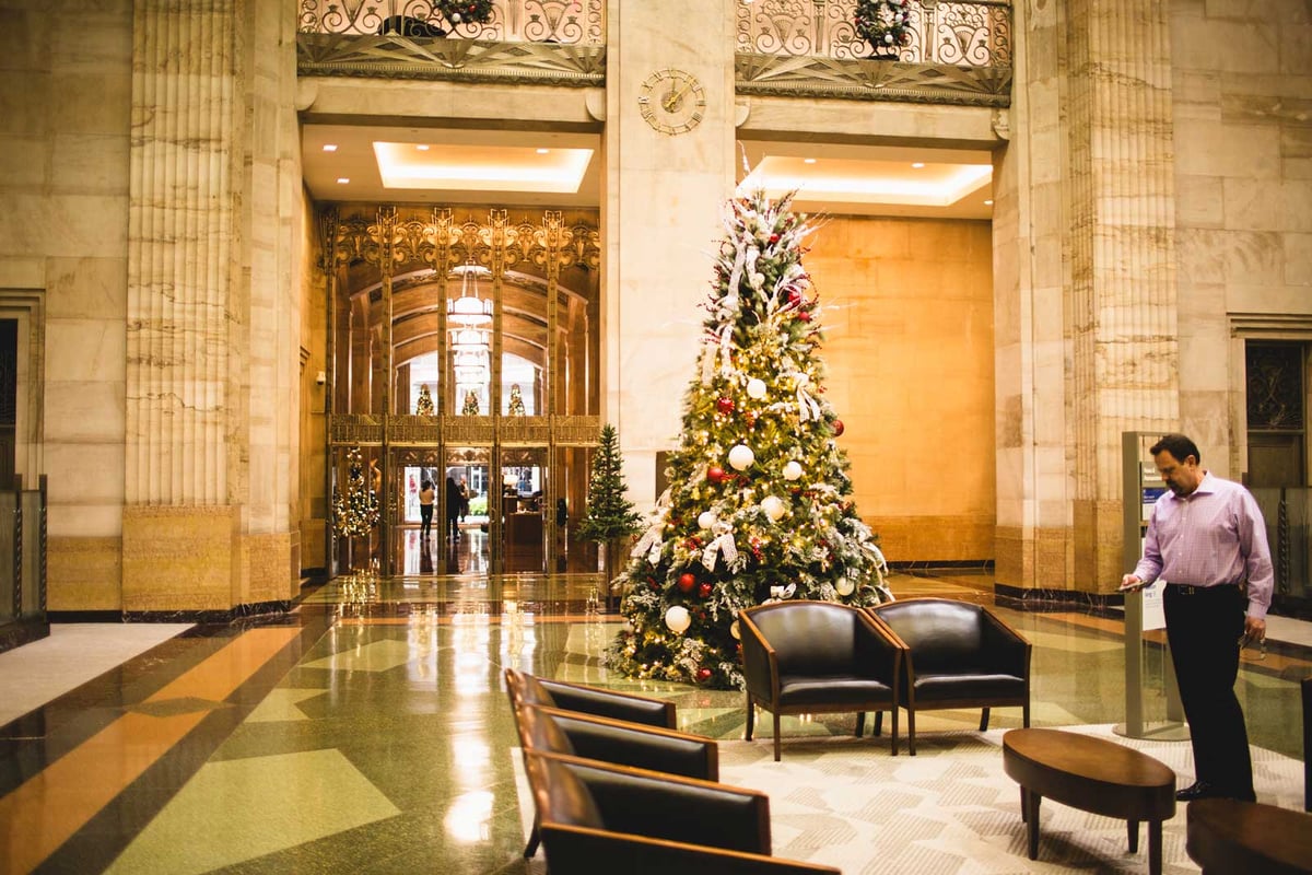 Red and White christmas tree in an office lobby