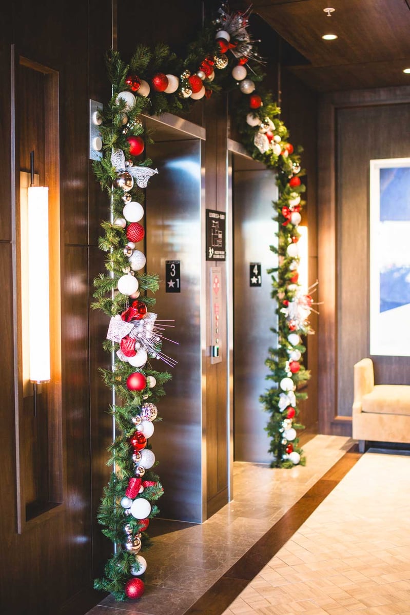 White and red garland in an elevator bay