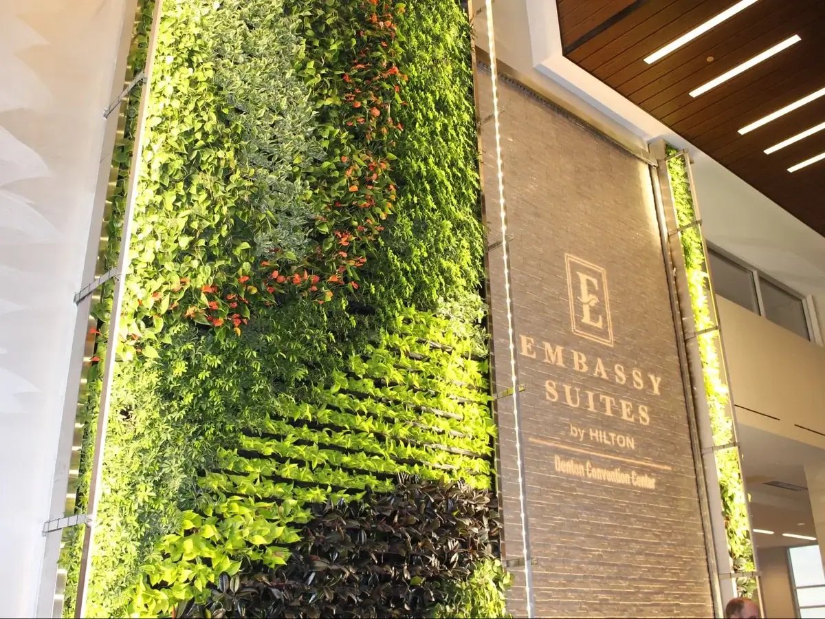 exterior living wall in a hotel entry way with waterfall