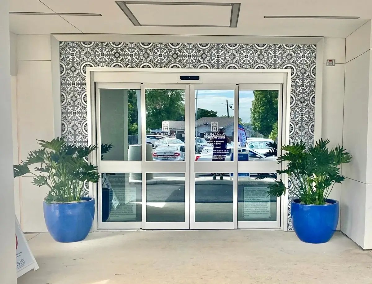 Exterior office plants with blue planters