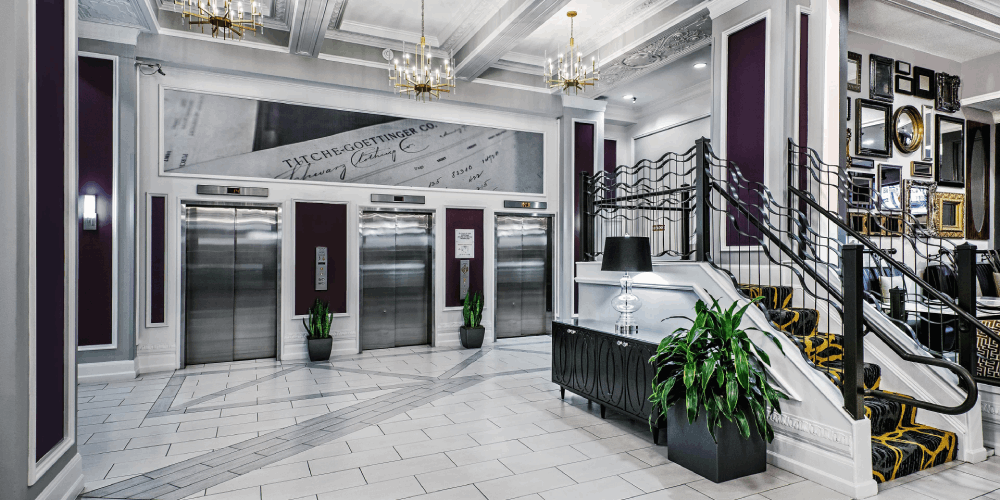 Hotel lobby lifts with indoor plants 