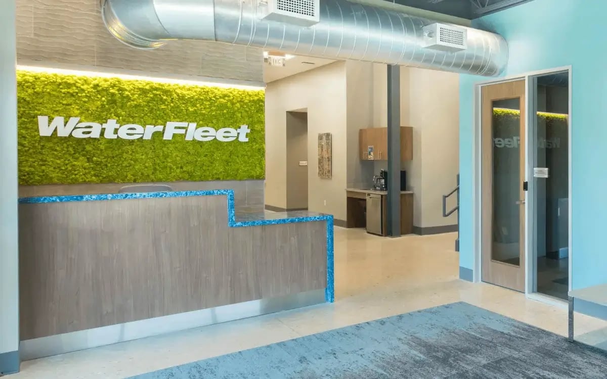 Moss Wall in an office with brand signage